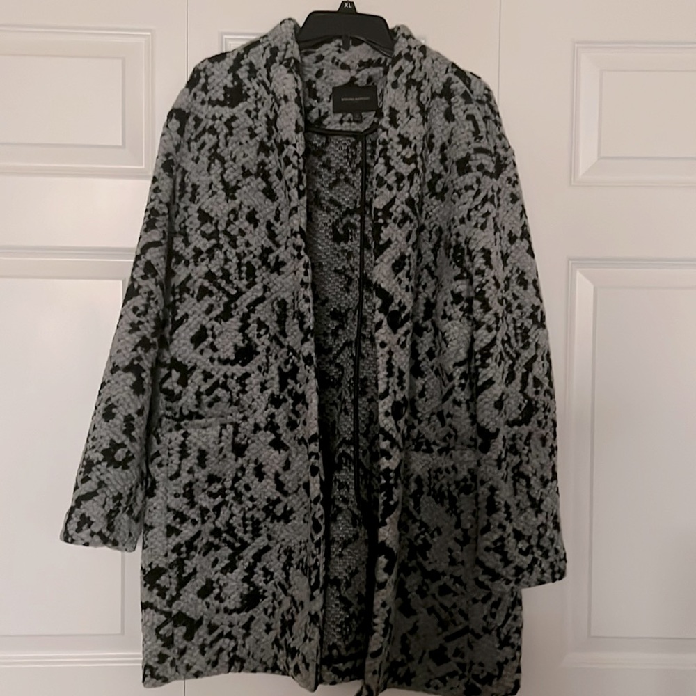 Women's knit collarless winter jacket. Brand new. Never worn. Size XL.